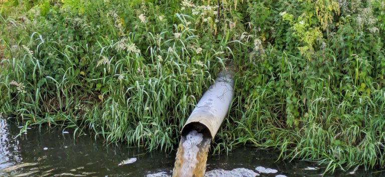 Pollution outflow pipe into river